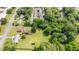 An elevated angle showing the property with its spacious yard, neighboring houses, and street access at 424 Camp Rd, Burlington, NC 27217