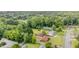 Residential area featuring houses and tree lined streets from an aerial perspective at 424 Camp Rd, Burlington, NC 27217