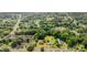 A beautiful aerial view of a neighborhood filled with tree lined streets and various houses at 424 Camp Rd, Burlington, NC 27217