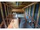 Unfinished attic space with exposed framing and potential for storage or renovation at 424 Camp Rd, Burlington, NC 27217