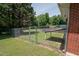 Fenced backyard with shed, creating a secure space for pets and outdoor activities at 424 Camp Rd, Burlington, NC 27217