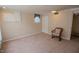 Bedroom with carpet flooring, built-in shelves, and a window at 424 Camp Rd, Burlington, NC 27217