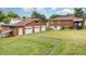 Aerial view of the property including the detached garage with three bays at 424 Camp Rd, Burlington, NC 27217
