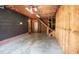 Spacious garage featuring stairs to unfinished second level and entry to bath at 424 Camp Rd, Burlington, NC 27217