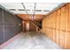 Large garage featuring a staircase and plenty of open space for parking and projects at 424 Camp Rd, Burlington, NC 27217
