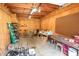 Spacious garage with concrete floor, overhead lighting, and ample space for parking and storage at 424 Camp Rd, Burlington, NC 27217