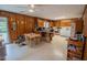 Spacious kitchen with wood paneling, large countertop and open floor plan at 424 Camp Rd, Burlington, NC 27217