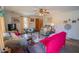Cozy living room with a ceiling fan, neutral walls, and comfortable seating at 424 Camp Rd, Burlington, NC 27217