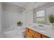 Bathroom featuring tub/shower combination, and wood vanity with white countertop at 4408 Jordan Oaks Way, Raleigh, NC 27604