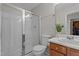 Clean bathroom offering a glass-enclosed shower, modern vanity, and decorative accents at 4408 Jordan Oaks Way, Raleigh, NC 27604