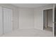 Bright bedroom featuring neutral walls, plush carpeting and a closet for ample storage at 4408 Jordan Oaks Way, Raleigh, NC 27604