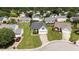 Aerial view of the home showing well-kept front lawn, driveway, and landscaping at 4408 Jordan Oaks Way, Raleigh, NC 27604