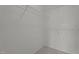 Empty walk-in closet with white wire shelving and neutral carpet at 4408 Jordan Oaks Way, Raleigh, NC 27604