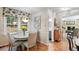 Bright breakfast nook with wooden floors and large window letting in natural light and views of the outdoors at 4521 Chicopee Trl, Durham, NC 27707