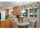 Breakfast nook with granite counters and light fixture at 4521 Chicopee Trl, Durham, NC 27707