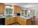 Kitchen area with granite counters and stainless steel sink at 4521 Chicopee Trl, Durham, NC 27707