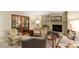 Comfortable living room featuring a fireplace, neutral tones, and an array of seating options at 4521 Chicopee Trl, Durham, NC 27707