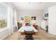 Bright and spacious bedroom featuring three windows, neutral decor, and a relaxing atmosphere at 47 Coventry Ln, Chapel Hill, NC 27516