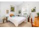 Cozy bedroom with carpet flooring, natural light and stylish decor, creating a relaxing retreat at 47 Coventry Ln, Chapel Hill, NC 27516