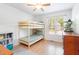 Bedroom featuring a wooden bunk bed, a ceiling fan and a window with blinds at 500 Hunters Ridge Dr, Fuquay Varina, NC 27526