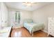 Cozy bedroom featuring a ceiling fan, a desk, and a full size bed at 500 Hunters Ridge Dr, Fuquay Varina, NC 27526