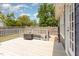The gray stained wood deck is fenced and has a great view of the backyard at 500 Hunters Ridge Dr, Fuquay Varina, NC 27526