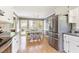 Bright kitchen with stainless steel appliances and a dining area with backyard access at 500 Hunters Ridge Dr, Fuquay Varina, NC 27526