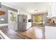 Spacious kitchen with white cabinets, stainless steel appliances, and backyard access at 500 Hunters Ridge Dr, Fuquay Varina, NC 27526