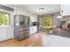 Well lit kitchen featuring stainless steel appliances, lots of cabinet space, and an arched window at 500 Hunters Ridge Dr, Fuquay Varina, NC 27526