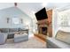 Bright living room with vaulted ceilings, fireplace and hearth, neutral paint, and stylish decor at 500 Hunters Ridge Dr, Fuquay Varina, NC 27526