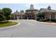 This charming clubhouse in Amberly features a cupola, well-maintained landscaping, benches, and bike parking at 5003 Blue Jack Oak Dr, Cary, NC 27519