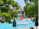 This beautiful community pool offers fun in the sun with a colorful splash pad, and a Colonial-style clubhouse nearby at 5003 Blue Jack Oak Dr, Cary, NC 27519