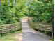 Picturesque view of the wooden boardwalk on the Greenway Trail in the Amberly community at 5003 Blue Jack Oak Dr, Cary, NC 27519