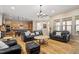 Spacious living room with hardwood floors, stylish furnishings, and an open layout at 5003 Blue Jack Oak Dr, Cary, NC 27519