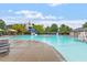 Community pool featuring a slide, lifeguard stand, and plenty of lounge seating at 5003 Blue Jack Oak Dr, Cary, NC 27519