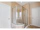 Modern shower with glass surround and shower head, providing a spa-like experience at 5003 Blue Jack Oak Dr, Cary, NC 27519