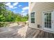 Deck with view of backyard and a light colored home in the background at 5011 Peachtree Town Ln, Knightdale, NC 27545