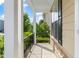 Cozy balcony space with stone facade, perfect for enjoying the outdoors at 5011 Peachtree Town Ln, Knightdale, NC 27545