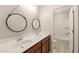 Bathroom featuring double sink vanity with granite countertops and modern fixtures at 5011 Peachtree Town Ln, Knightdale, NC 27545