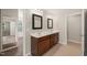 Bathroom featuring a double vanity with a tile floor at 5011 Peachtree Town Ln, Knightdale, NC 27545
