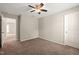 Comfortable bedroom with carpet floor and ceiling fan at 5011 Peachtree Town Ln, Knightdale, NC 27545