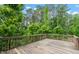 Wooden deck with a view of mature trees at 5011 Peachtree Town Ln, Knightdale, NC 27545