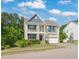 Inviting two-story home with a welcoming front yard and beautiful architectural details at 5011 Peachtree Town Ln, Knightdale, NC 27545