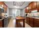 Well-lit kitchen features stainless steel appliances and a wood island at 5016 Swordfish Dr, Raleigh, NC 27603