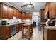 Well-equipped kitchen featuring stainless steel appliances, custom cabinets and stone countertops at 5016 Swordfish Dr, Raleigh, NC 27603