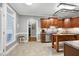 Bright kitchen with stone countertops, stainless steel appliances, and eat-in table at 5016 Swordfish Dr, Raleigh, NC 27603