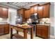 Kitchen featuring stainless steel appliances and a wood island at 5016 Swordfish Dr, Raleigh, NC 27603