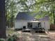 Backyard view with deck, grill, gazebo, and ample seating for outdoor enjoyment at 503 Pine Run, Knightdale, NC 27545
