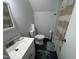 Bathroom with a vanity sink, standard toilet, and a shower at 503 Pine Run, Knightdale, NC 27545
