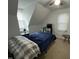 Cozy bedroom with neutral carpet, a sloped ceiling, and lots of natural light at 503 Pine Run, Knightdale, NC 27545